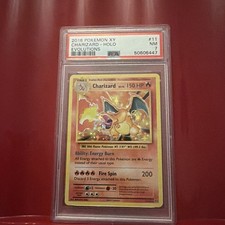 Pokemon Charizard 11/108 Evolutions Holo Rare English PSA 7 picture