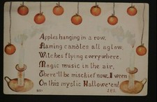 1910s F.A Owen Co. Halloween Postcard Hanging Apples and Candlesticks  picture