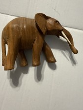 Hand Carved Vintage Wooden Elephant Sculpture with tusks picture