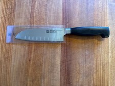 Zwilling Four Star ⭐️⭐️⭐️⭐️ 5.5” Hollow Edge Santoku Knife picture