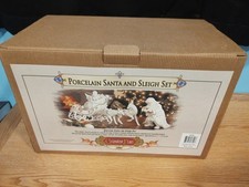 Grandeur Noel 2001 Collectors Edition Porcelain Santa and Sleigh Set w/Reindeer picture