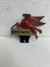 VINTAGE ORIGINAL MOBIL PEGASUS DRIVE SAFELY LICENSE PLATE TOPPER GAS OIL picture