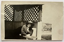 Vintage RPPC - Woman In Hat Lounging In Lattice Gazebo | Photo Postcard picture