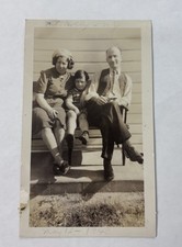 Vtg B&W Snapshot Family Portrait Sitting on Bench Mother Father Son Photo picture