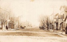 J86/ Millington Michigan RPPC Postcard c1910 State St Stores Wagons 187 picture