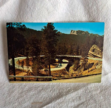 Dexter Press Double Pigtail Bridge Mt Rushmore Rapid City SD Postcard picture