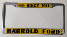 VTG Metal Yellow Harrold Ford Since 1911 Dealership Checker License Plate Frame picture
