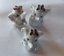 Vintage 1980's Iridescent White Porcelain Elephant with Butterflies Set of 3 picture