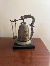 This is a vintage Chinese ceremonial brass or bronze bell picture