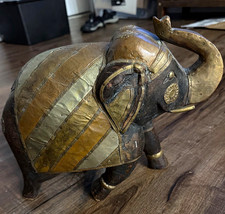 Vintage hand-carved Wooden Elephant with brass and copper inlay picture