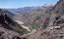 Approaching Telluride Colorado Advertising Jeep Rentals Yellow Fleet Postcard picture