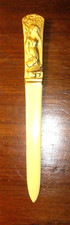 Antique Celluloid Letter Opener Girl Watering Flowers in Relief Gilded  7 5/8