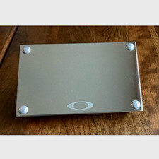Original Oakley Silver sunglass display mirror brand new in box I have a bunch picture