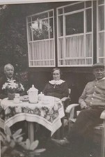 Antique Postcard Real Photo People Having Tee In Garden Unposted picture