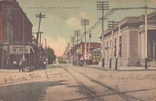 Antique Postcard GREENVILLE MISS POPLAR ST Looking N 1908 Signs Poles Wagon picture