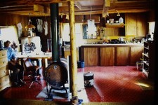 c1970's Kodachrome 35mm Slide, Rustic Cabin Interior Wood Stove Kitchen blue picture