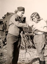 US serviceman lights cigarette a member Womens Voluntary Servic- 1942 Old Photo picture