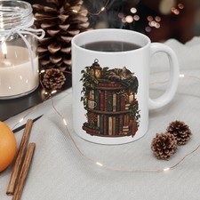 Cozy Cat on Bookshelf Coffee Mug Books and Plants Ceramic Cup Gift 11oz picture