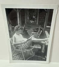 1962 Vintage Snapshot Woman Reading on Porch Mid-Century Leisure Photo Kodak picture