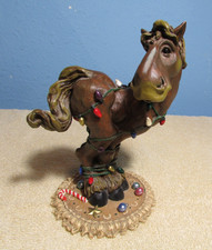 Elmer the Horse Figurine Wrapped in Christmas Lights picture