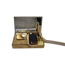 Vintage 1960s Entre Nous by Daniel Art Deco Gold Tone Vintage Make Up Compact picture