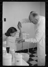 Photo:Doctor Examining Girl Hospital 1930s Black and White Photograph picture