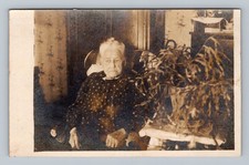 Postcard Midwestern Elderly Lady Woman Seated in Chair with Plant Photo RPPC picture