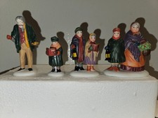 Vintage  Handpainted porcelain Xmas village set of 4 figures in original box picture