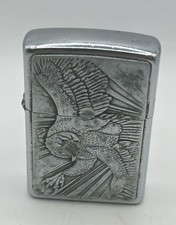 Vintage 1996 Zippo Lighter Barrett Smythe Eagle Emblem 3D Raised Plate -Sparking picture