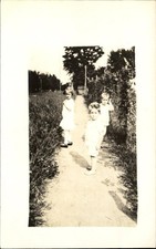 RPPC real photo 1904-1918 ~ little boys and little girl on garden path picture