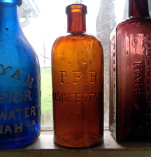 P.R.R.DISINFECTANT (PENNSYLVANIA RAILROAD) 1890 HAND BLOWN BOTTLE USED IN RR CAR picture