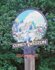 PHOTO  CONEY WESTON VILLAGE SIGN (DETAIL) IN THE SKY ABOVE ST MARYÂS CHURCH AR picture