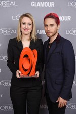 Honoree Elizabeth Holmes poses backstage with her award actor Jare - Old Photo picture
