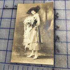 Vintage Picture Postcard 1917 Woman In Granny Boots Holding Bouquet Of Flowers picture