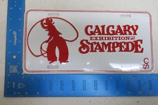 NOS CALGARY ALBERTA EXHIBITION STAMPEDE METAL BOOSTER LICENSE PLATE EMBOSSED BB1 picture