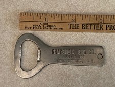 Vtg KNAPSTEiN BRG Co. Phone 100 New London, Wis. BEER BOTTLE OPENER metal RARE picture