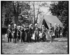 Photo:Military Officers in Uniform by Tent Outdoor Gathering picture