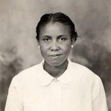c1950s African American Woman RPPC Studio Portrait Pearl Earrings White Blouse picture