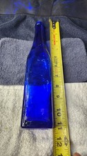 Vintage Cobalt Blue Glass Bottle with Embossed Bottom picture