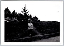 Vtg B&W Snapshot Woman Holding Forney Ridge Elevation Sign Vintage Cars 1950s picture