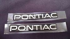 SET OF 2 - NOW OEM Pontiac Emblems Genuine GM - Black Silver picture