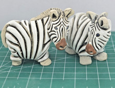 Two Vtg Artisenia Rinconada zebra carved figurines Uruguay signed black/white picture
