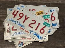 20- South Dakota Embossed License plates-1987-91 Mount Rushmore-good Shape picture