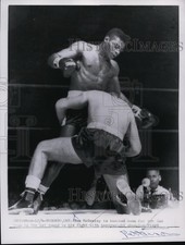 1961 Press Photo Tom McNeeley downed by Floyd Patterson at Toronto bout picture