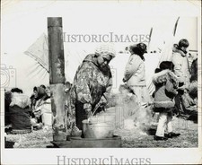 Press Photo Point Hope woman stirs pot outside - lrb34590 picture