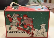 Vintage CHRISTMAS CARDBOARD CANDY CONTAINER BOX w/WOVEN HANDLE - KIDS SLED & DOG picture