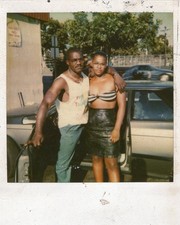 VINTAGE POLAROID PHOTO SERIOUS AFRICAN AMERICAN COUPLE TUBE TOP AMERICANA CAR picture