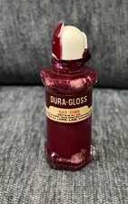 vintage mid-20th-century Dura-Gloss nail polish bottle in the shade 