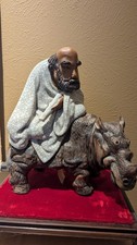 Budda man Rining On A Rhino (antique) picture