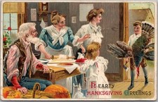Vintage 1909 THANKSGIVING Embossed Postcard Kitchen Scene / Boy with Dead Turkey picture
